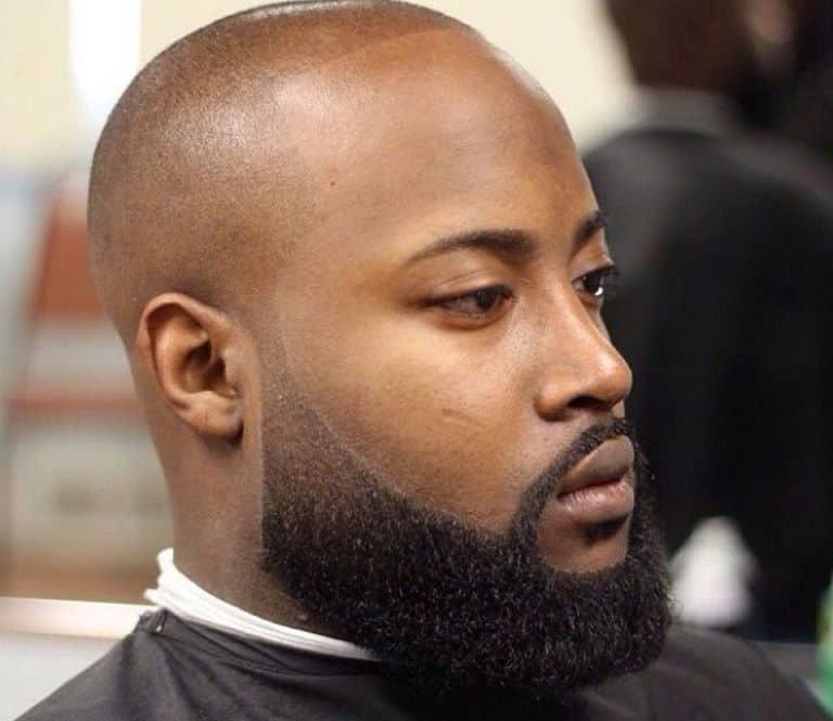 hombre negro barba estilo fade